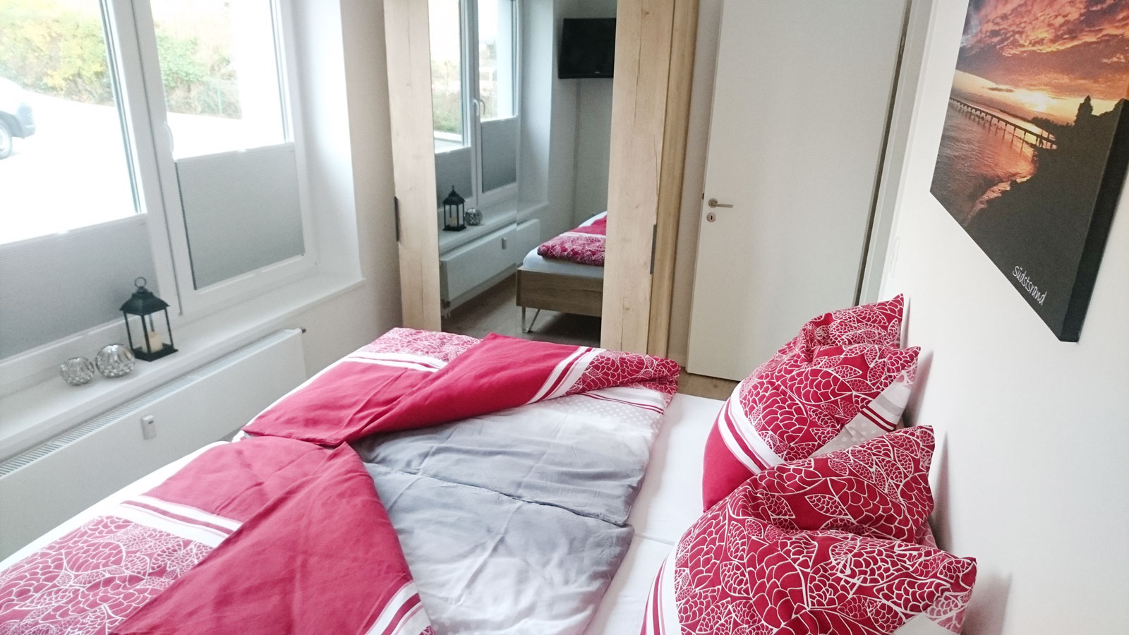 Schlafzimmer 1 | Bildergalerie-Tags: Ferienwohnung, Fehmarn, Ostsee